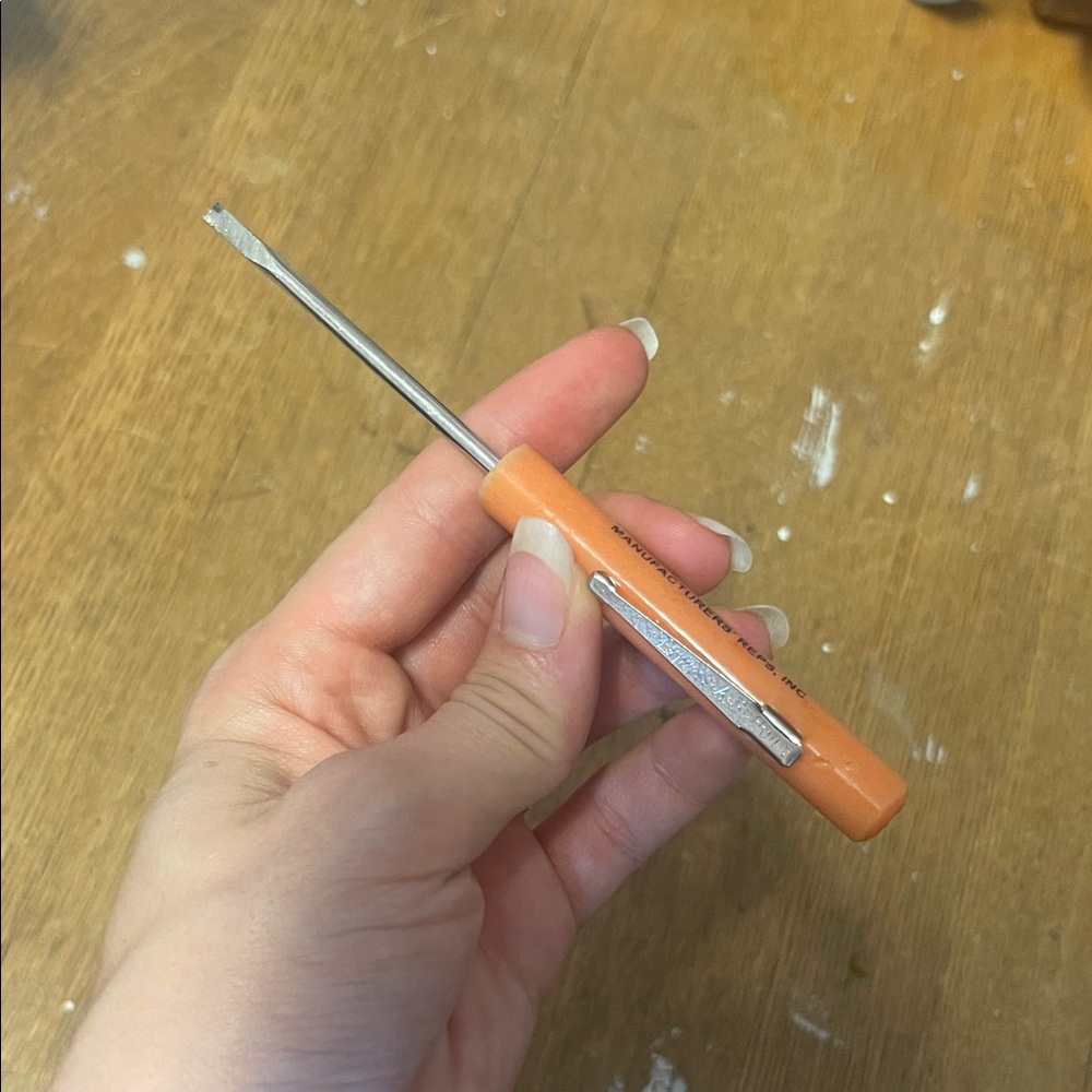 Orange Hand Tool with Clip